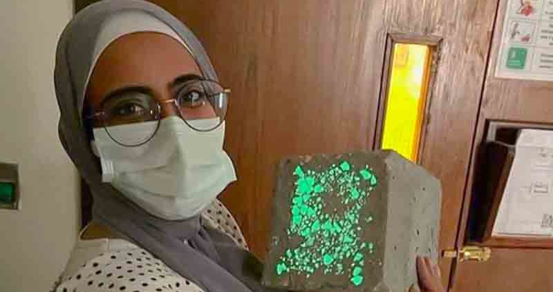 AUC Student Holding Glow-in-the-Dark Concrete